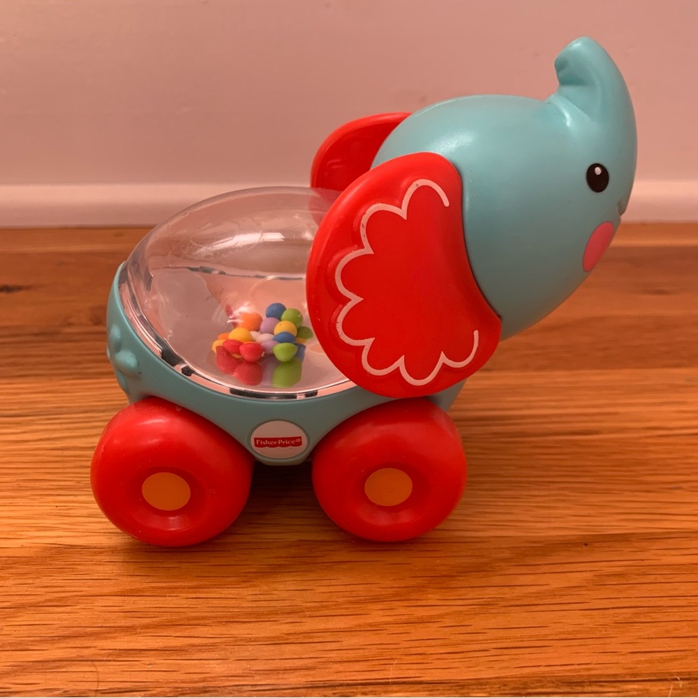 Fisher-Price Elephant Toy Rolling Elephant with Rainbow Confetti Balls Rattle